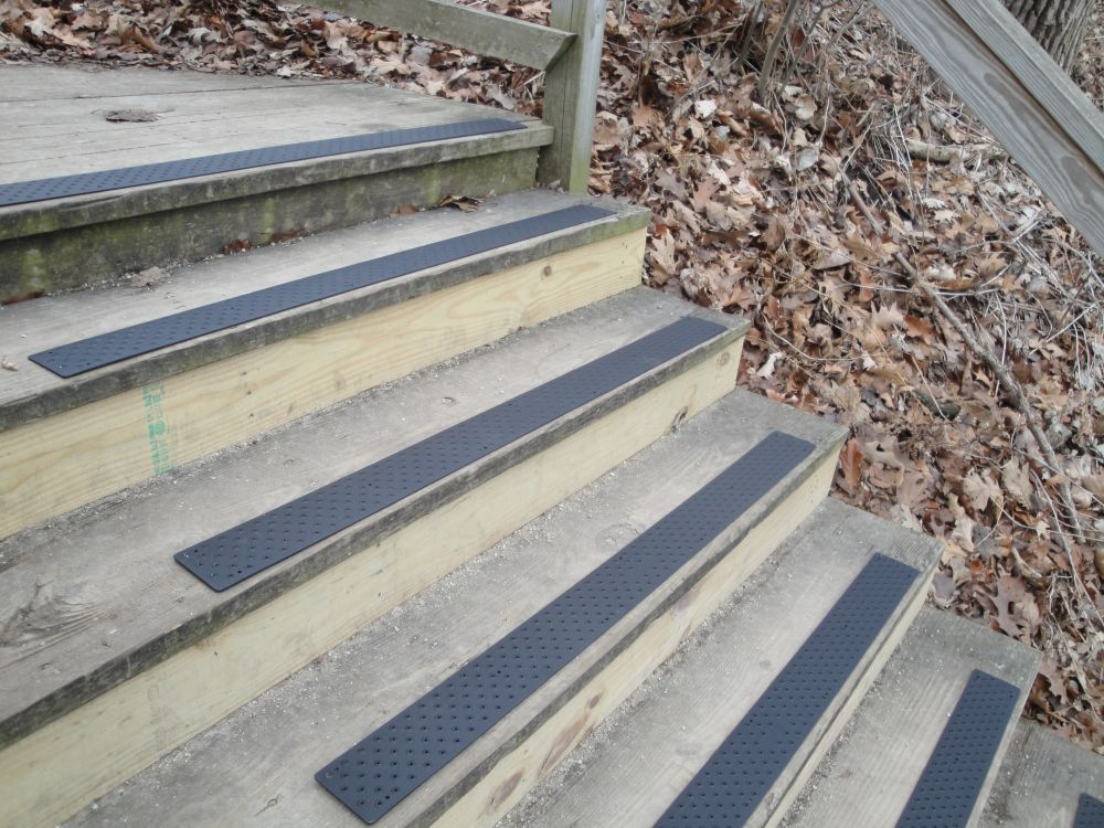 handi-treads-48-black-deteriorating-wood-steps-forest-algae